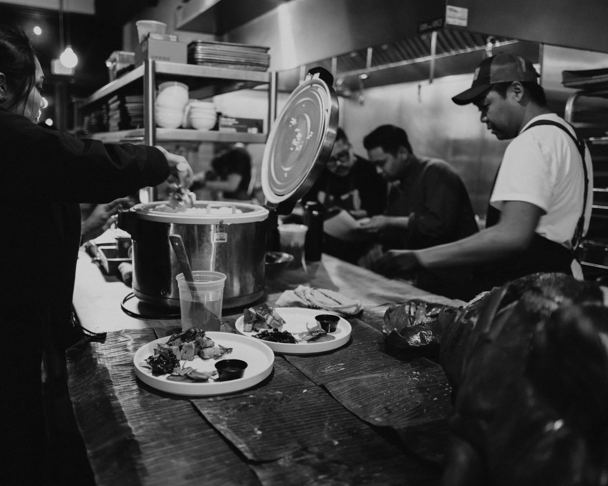 Lechon being carved for guests at a Sun Rice private event